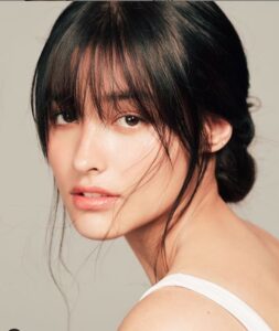 Low bun with bangs