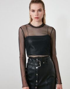 Pair your Sleeveless top with a sheer top or shrug