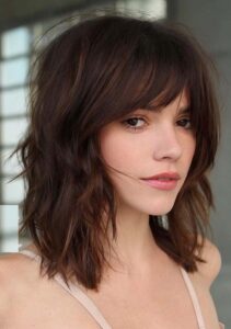 Shoulder length hairstyle with bangs