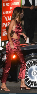 Kendall’s satin attire with flip flops
