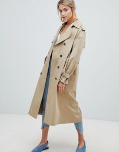 Oversized trench coat styling