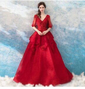 Red lace ball gown with cap sleeves and pattern back
